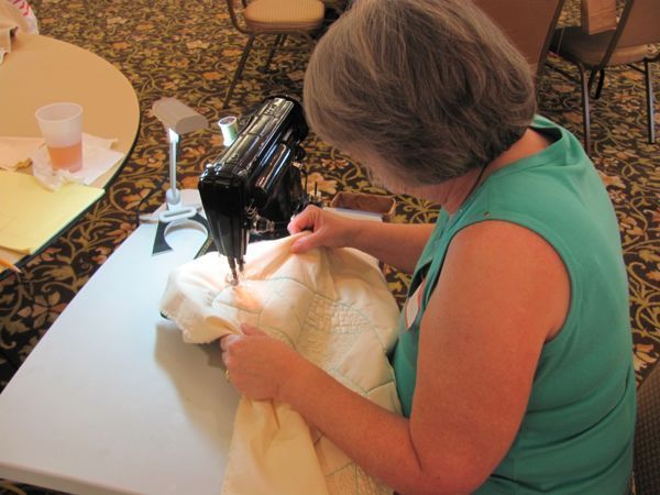 Janice doing beautiful work on her Singer sewing machine
