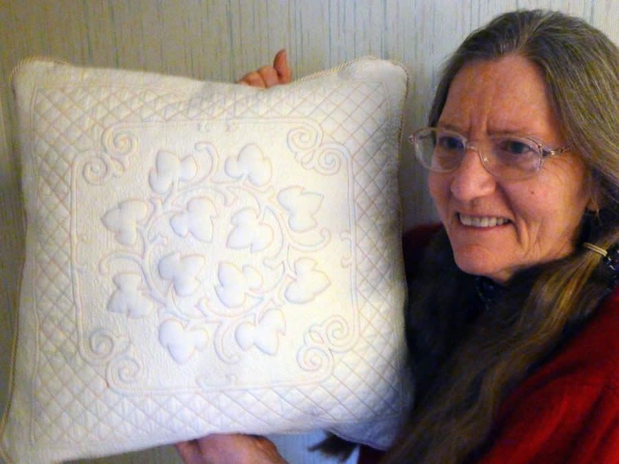 Eva Nipp with her pretty oak wreath pillow