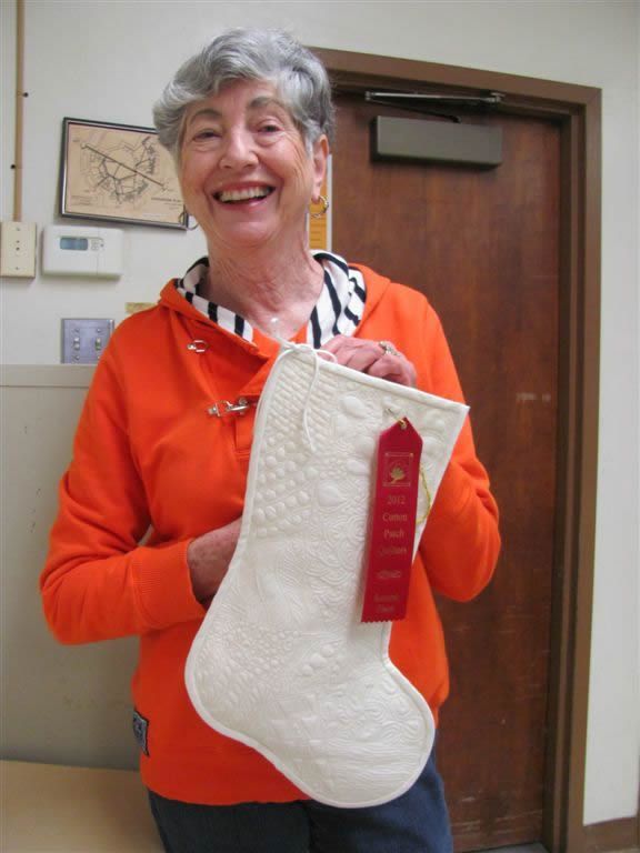 Carolyn Campbell-Taylor with her 2nd Place prize winning Christmas stocking